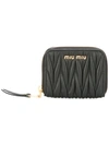 Miu Miu Lettering Logo Zipped Purse In Black