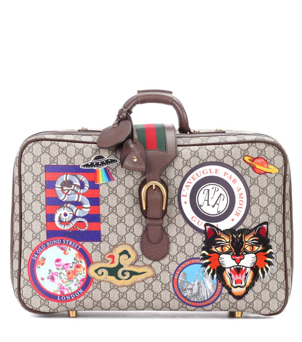 Gucci Coated-canvas Travel Bag In Leige Eloey | ModeSens