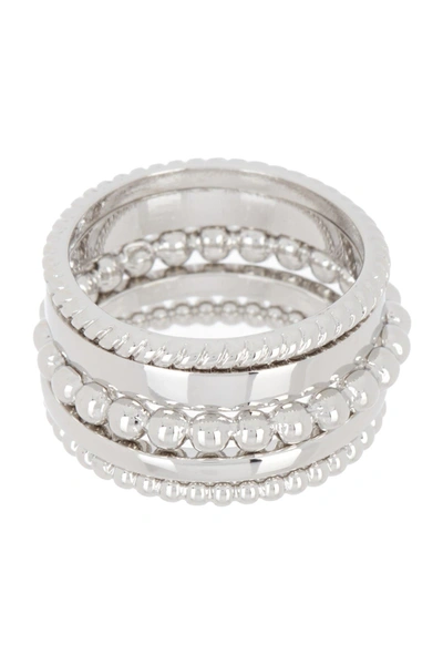 Halogen Mixed Texture Metal Ring Stack In Rhodium