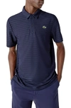 Lacoste Jacquard Stripe Ultra Dry Perfomance Polo In Navy Blue