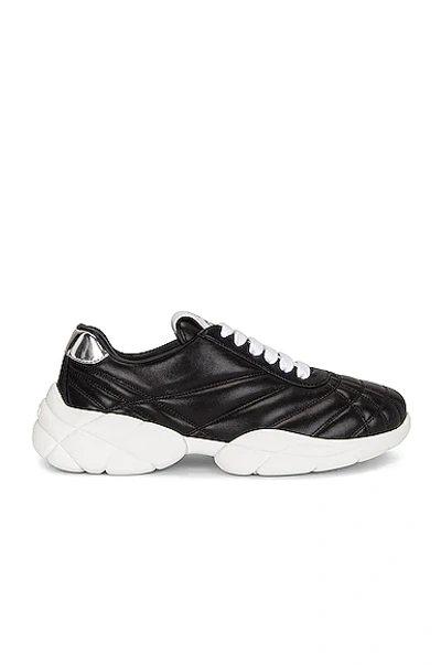 Miu Miu High Sneakers In Quilted Nappa In Black