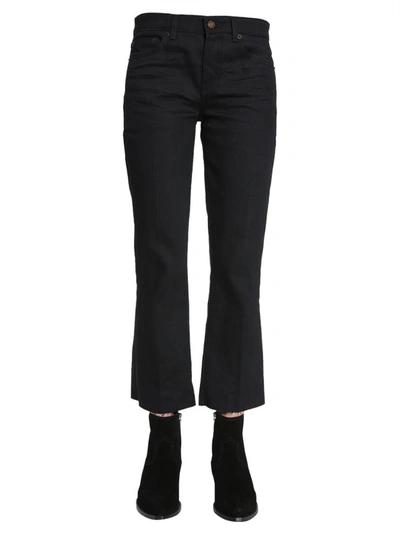 Saint Laurent Cropped Raw Edge Jeans In Black