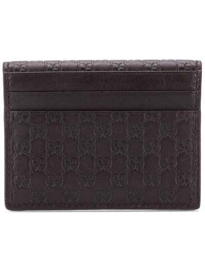 Gucci Embossed Gg Card Holder In Nero