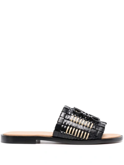 Loewe Slides Sandals Made Of Woven Leather With Anagram In Black