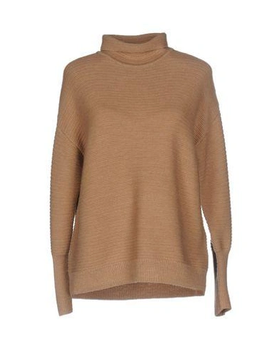 Folk Turtlenecks In Camel