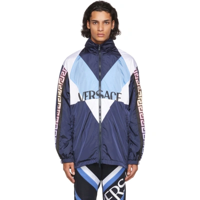 Versace Logo-print Panelled-shell Track Jacket In Blue