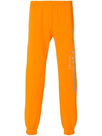 Gosha Rubchinskiy Cotton Sweatpants With Reflective Print In Orange