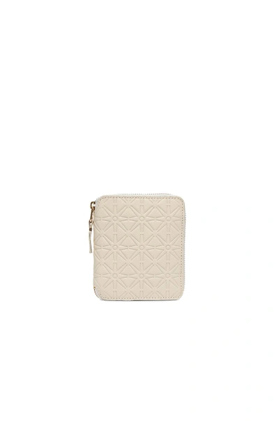 Comme Des Garçons Star Embossed Zip Fold Wallet In Off White