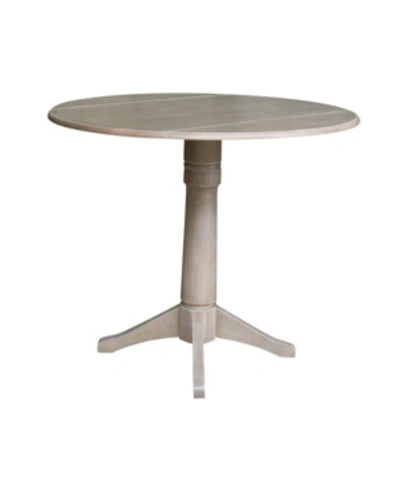 International Concepts 42" Round Dual Drop Leaf Pedestal Table In Gray