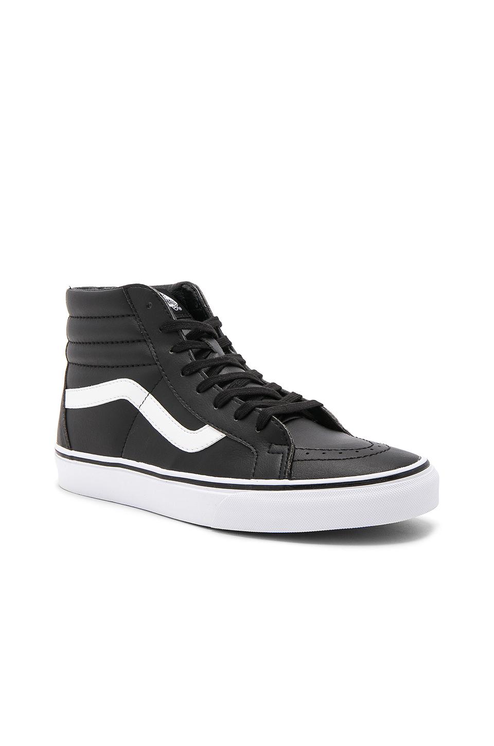 black and white vans lace up