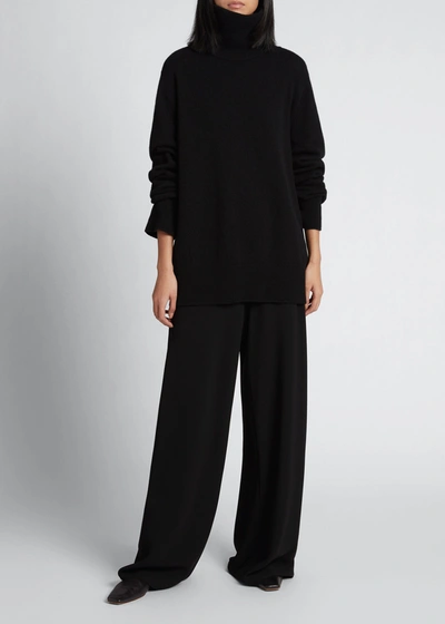 The Row Milina Oversized Turtleneck Sweater In Black