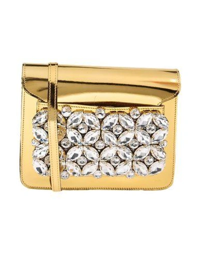 Gedebe Handbags In Gold