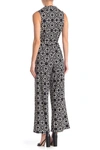 Nina Leonard Sleeveless Faux Wrap Jumpsuit In Black/ White