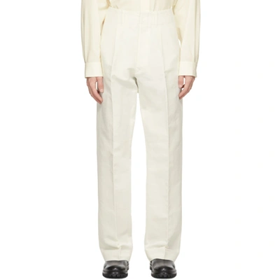 Uniforme Off-white Wide Leg Pleated Trousers In Offwhite