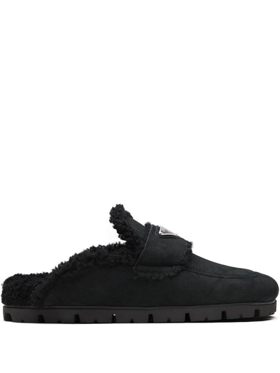 Prada Triangle Logo-plaque Shearling Backless Loafer In Black