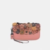 Coach Clutch Im Tea Rose"-design In Melon/black Copper