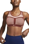 Nike Fe/nom Flyknit Racerback Sports Bra In Firewood Orange/echo Pink