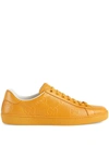 Gucci Men's Gg Embossed Ace Sneaker In Yellow