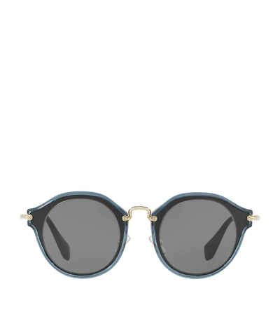 Miu Miu Round Sunglasses In Black