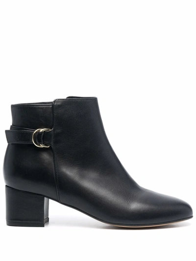 Tila March Heeled Slip-on Leather Boots In Black