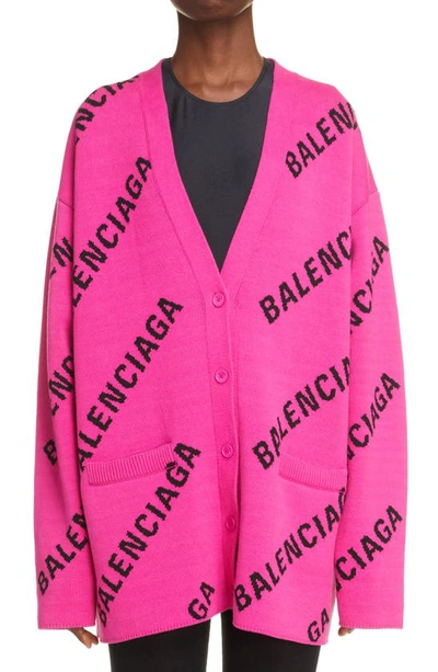Balenciaga Wool And Cotton Cadigan With Allover Logo Print In Pink/ Black