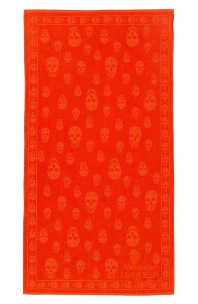 Alexander Mcqueen Tonal Skull Towel In Orange