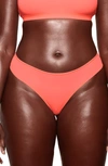 Skims Fits Everybody Thong In Neon Coral