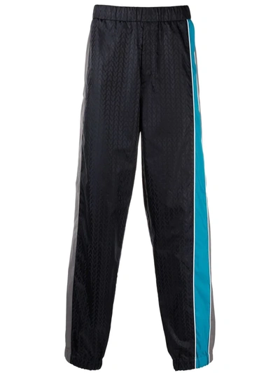 Valentino Navy Logo Panelled Shell Track Pants In Navy Blue