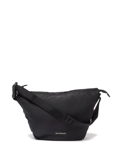 Balenciaga Oversized Logo-appliquéd Nylon Messenger Bag In Black