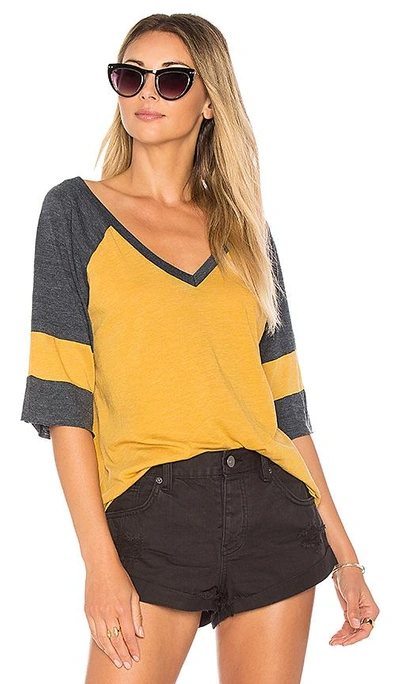 Chaser Blocked Jersey V Neck Tee In Marigold & Canopy