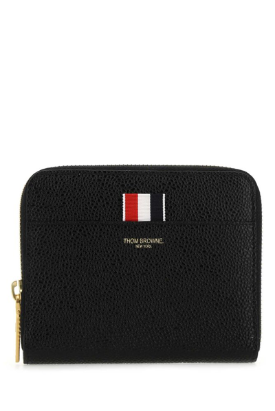Thom Browne Logo Embossed Zipped Wallet In 001