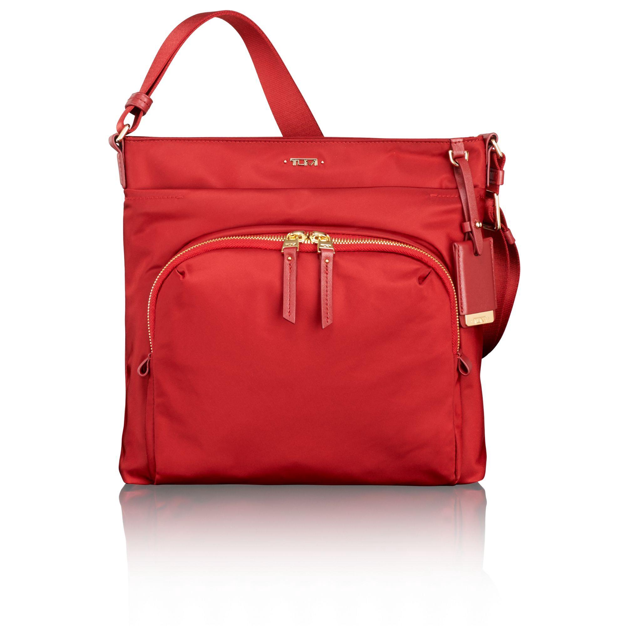 tumi red luggage