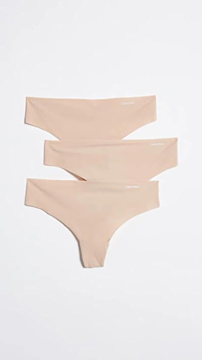 Calvin Klein Underwear 3 Pack Invisibles Thongs In Light Caramel