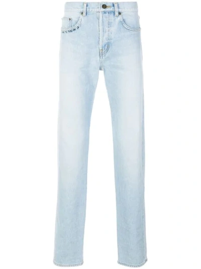 Saint Laurent Denim Jeans With Embroidered Logo In Light Blueblu