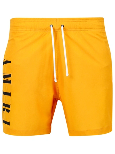 Amiri Vertical Logo Swim Trunks Gold Yellow In Yellow & Orange