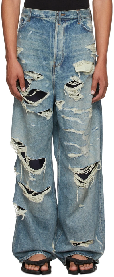 Balenciaga Man Wide Jeans With All-over Rips In Light Wash Blue Denim In 8146 Dirt Smoky Ligh