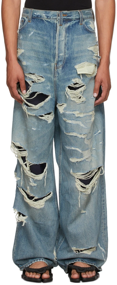 Balenciaga Man Wide Jeans With All-over Rips In Light Wash
