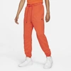 Jordan Essentials Men's Fleece Pants In Orange