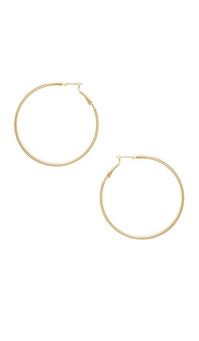 8 Other Reasons Conquer Earrings In Metallic Gold.