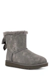Ugg Mini Bailey Bow Glimmer Faux Fur Lined Boot In Charcoal
