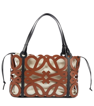 Anagram large cutout leather and cotton-canvas tote