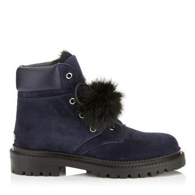 Jimmy Choo Elba Flat Navy Suede Boots With Fur Pom Poms In Blue