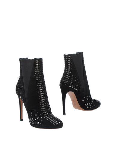 Alaïa Ankle Boots In Black | ModeSens