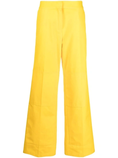 Raf Simons Straight-leg Logo-patch Trousers In Yellow