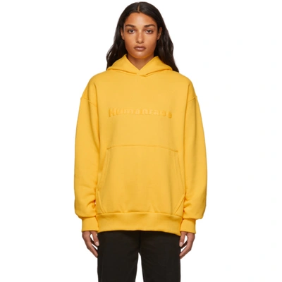 Adidas X Humanrace By Pharrell Williams Ssense Exclusive Humanrace Tonal Logo Hoodie In Bold Gold