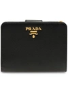 Prada Logo Zipped Wallet In Black