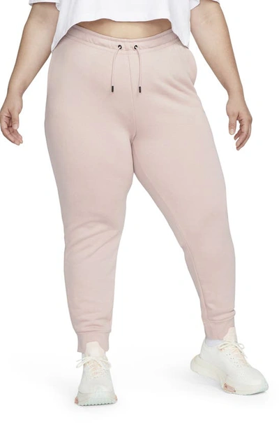 Nike Women's  Sportswear Essential Fleece Pants (plus Size) In Pink