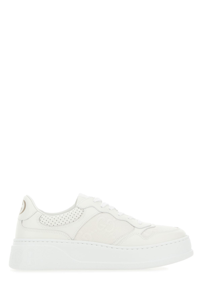 Gucci Gg Embossed Leather Sneakers In White