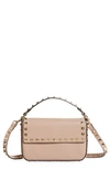 Valentino Garavani Mini Rockstud Leather Top Handle Bag In Light Pink