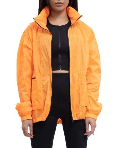 Voice Of Insiders Lightweight Wind-resistant Jacket W/ Pouch In Tiger Orange